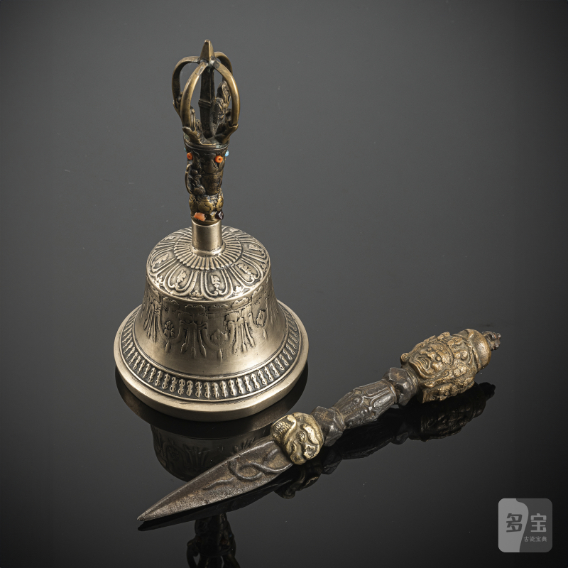 A metal bell (ghanta) and a phurbu